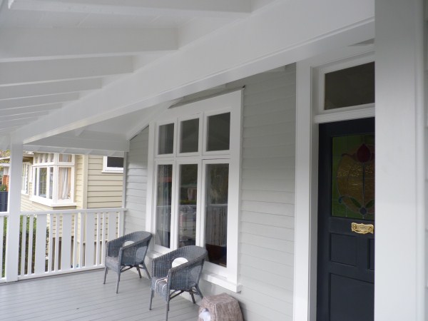 Decorative interior cornice and ceiling line freshly painted in soft white